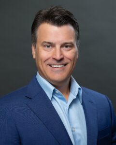Head and shoulders portrait of Adam Magdziarz
